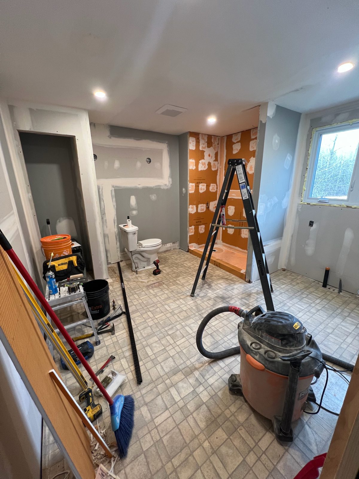 Shower waterproofing and drywall in progress